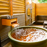Guest room with an open-air bath in the wood